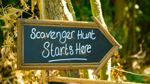 Sign reading "Scavenger Hunt Starts Here" 