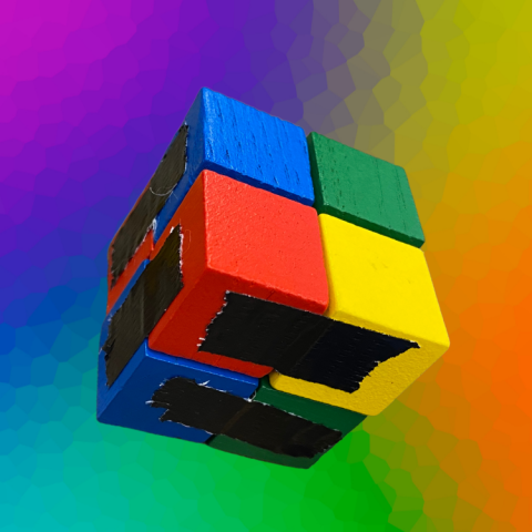 Image of fidget cube made of small wooden blocks and tape