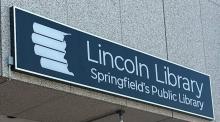 Outdoor sign with Lincoln Library logo